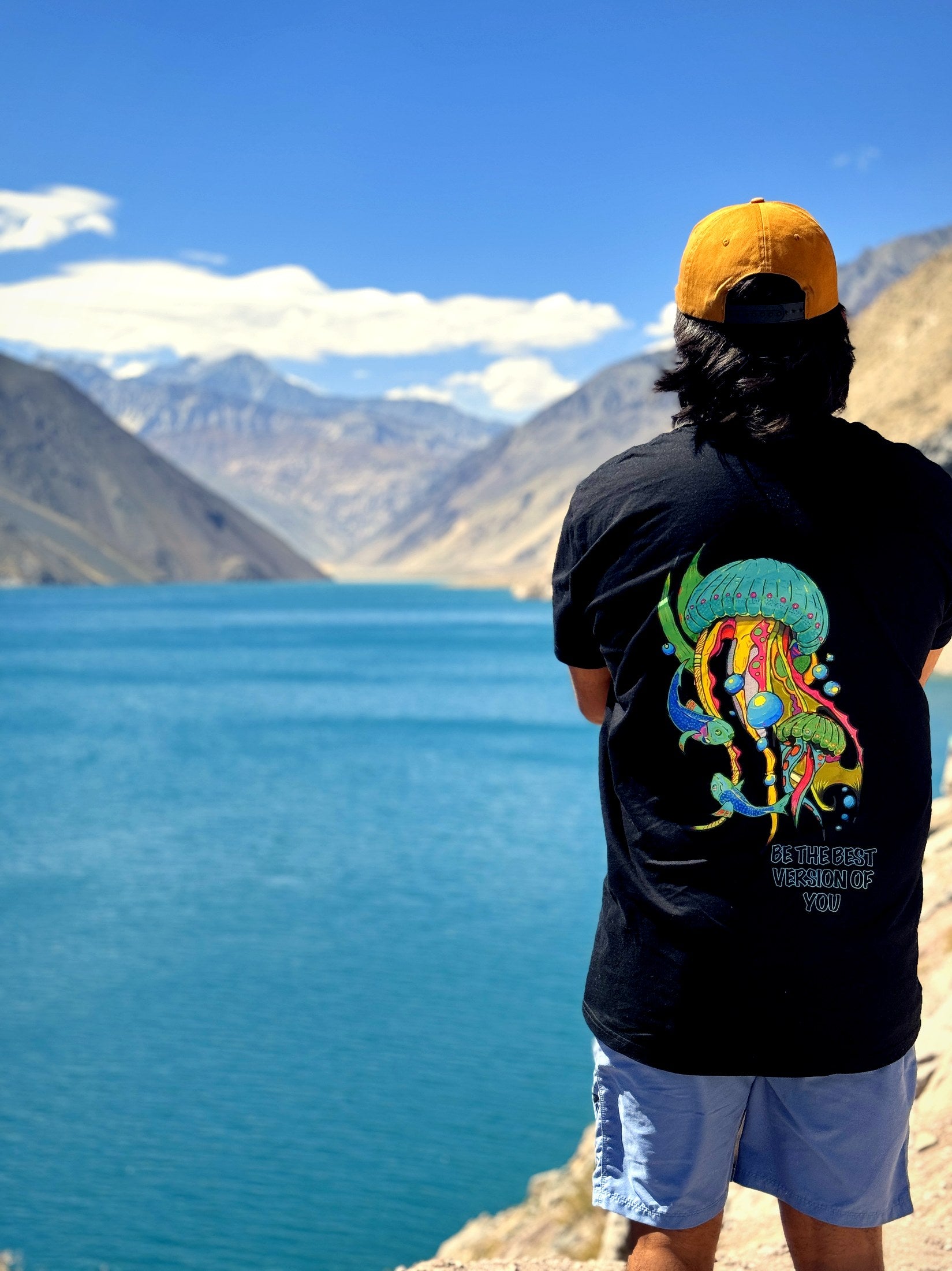 Ocean Spirits — Altiplano tee worn at a turquoise lake